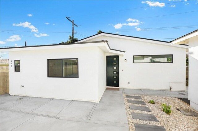 view of front of property with a patio