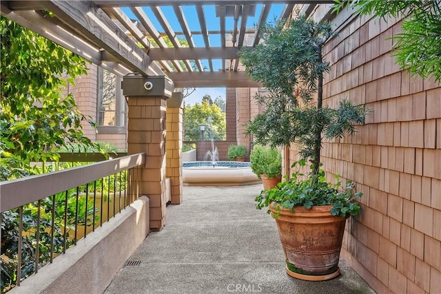 view of patio / terrace featuring a pergola