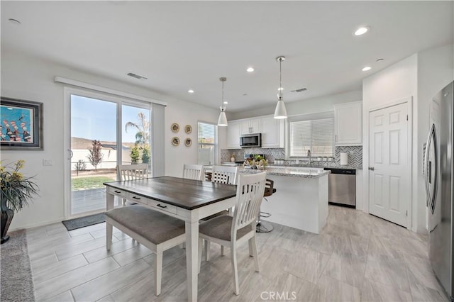 dining space with sink