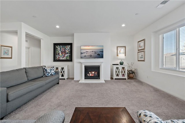 living room featuring light colored carpet