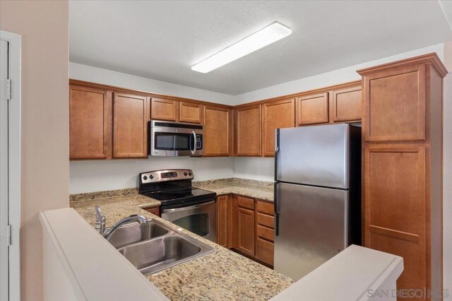 kitchen with stainless steel appliances and sink