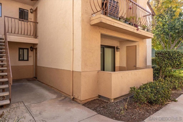 view of home's exterior featuring a balcony