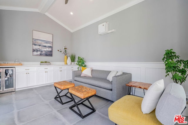 living room with lofted ceiling with beams, wine cooler, bar, and ornamental molding