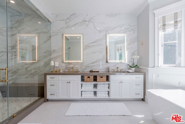 bathroom with shower with separate bathtub, vanity, tile walls, and crown molding