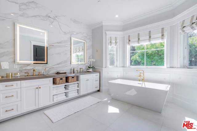 bathroom featuring vanity, crown molding, and a bath