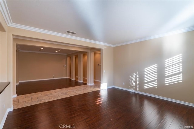 unfurnished room with wood-type flooring and crown molding