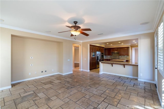 unfurnished living room featuring ceiling fan and crown molding