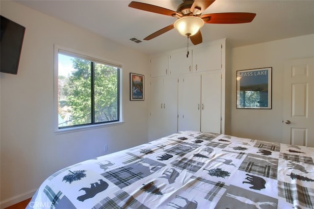 bedroom featuring a closet and ceiling fan