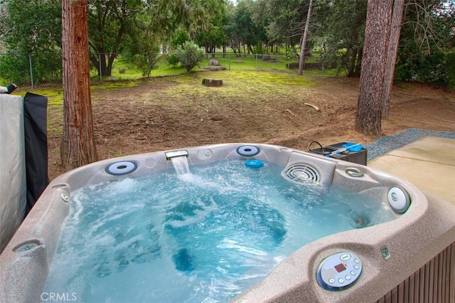 exterior space featuring a hot tub