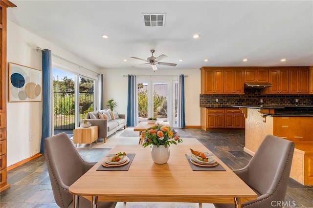 dining room featuring ceiling fan