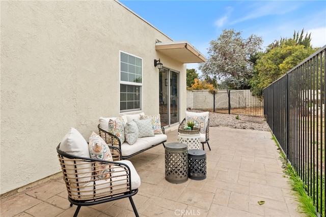 view of patio with outdoor lounge area