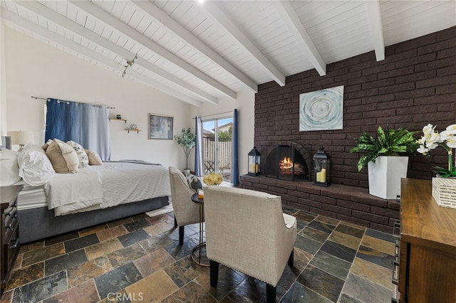 bedroom featuring vaulted ceiling with beams, wooden ceiling, and brick wall