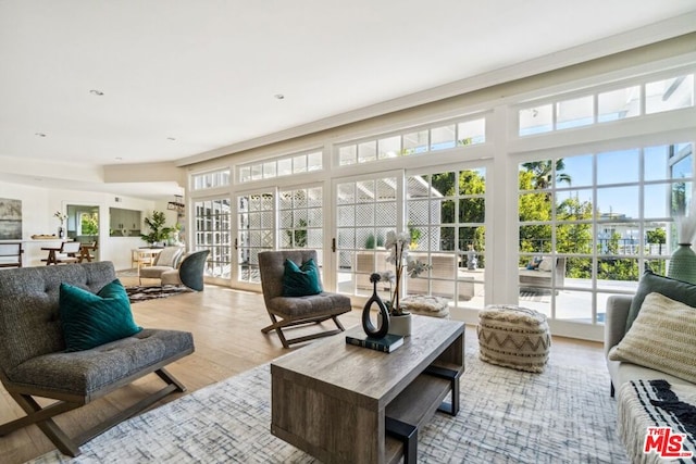 sunroom featuring plenty of natural light