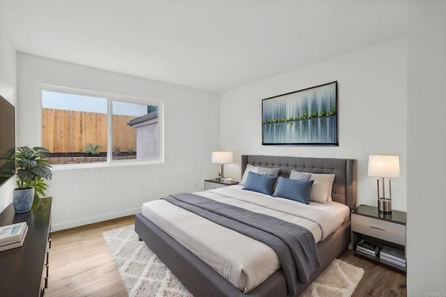 bedroom featuring light hardwood / wood-style floors