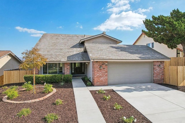 view of front of property featuring a garage