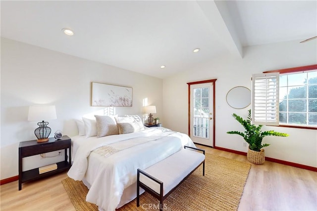 bedroom with access to outside, lofted ceiling with beams, and light wood-type flooring