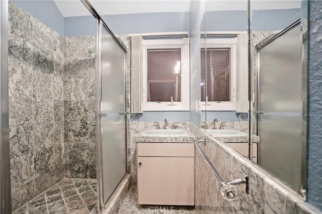 bathroom featuring vanity and walk in shower