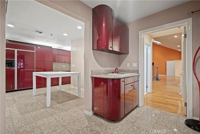 kitchen featuring sink and light hardwood / wood-style floors