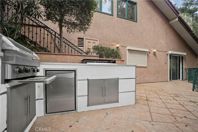 view of patio with area for grilling