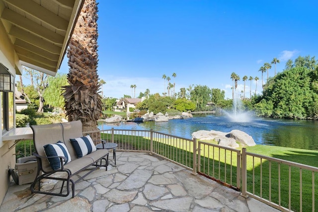 view of patio / terrace with a water view