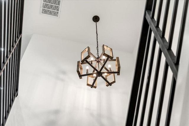 details with an inviting chandelier