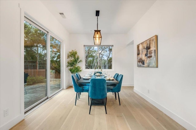 dining space featuring light hardwood / wood-style flooring