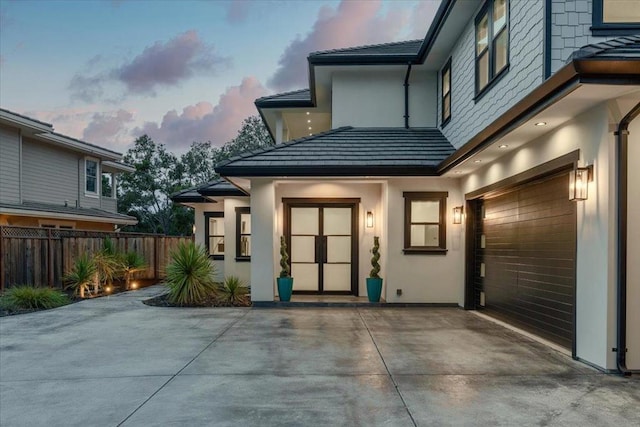 exterior space with a garage