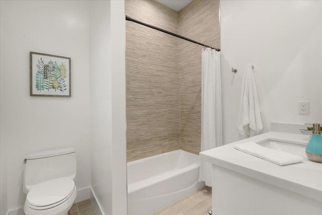 full bathroom with toilet, shower / bath combo, vanity, and tile patterned floors