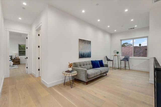 living room with light hardwood / wood-style floors