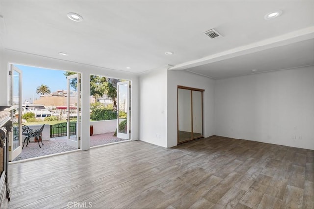 empty room featuring wood-type flooring