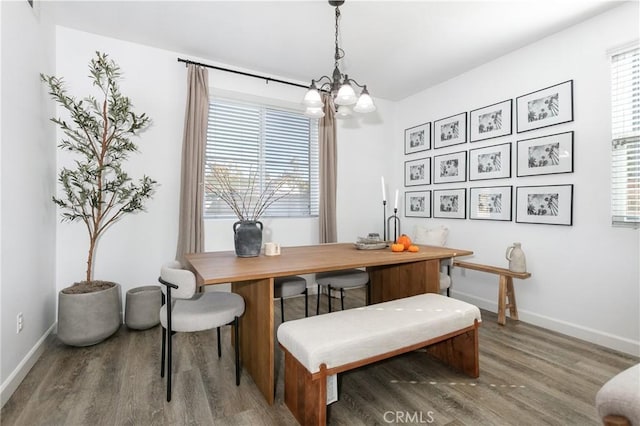 office area with plenty of natural light and hardwood / wood-style floors