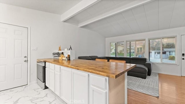 kitchen featuring electric range, wood counters, light hardwood / wood-style flooring, lofted ceiling with beams, and white cabinets