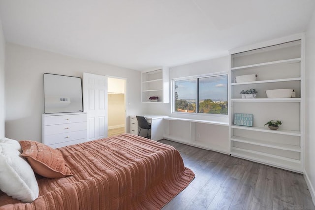 bedroom with hardwood / wood-style flooring