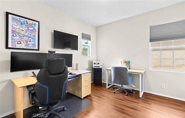 office area with hardwood / wood-style floors