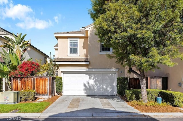 view of front of home with a garage