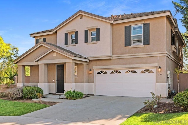 front of property with a garage