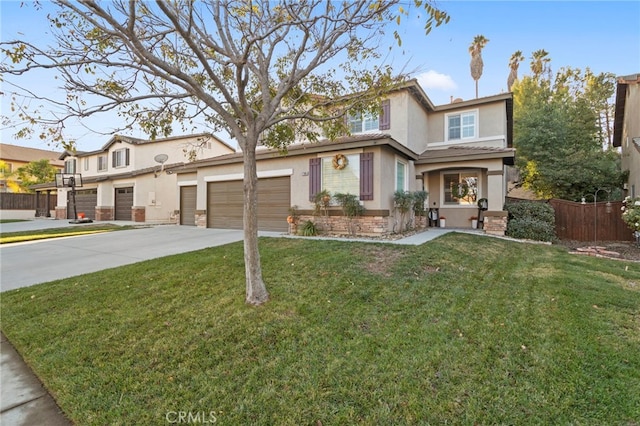 front facade featuring a garage and a front lawn