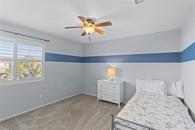 unfurnished bedroom with light colored carpet and ceiling fan