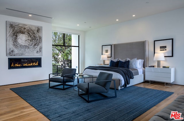 bedroom featuring hardwood / wood-style floors