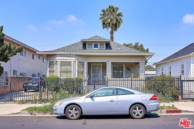 bungalow-style house featuring covered porch