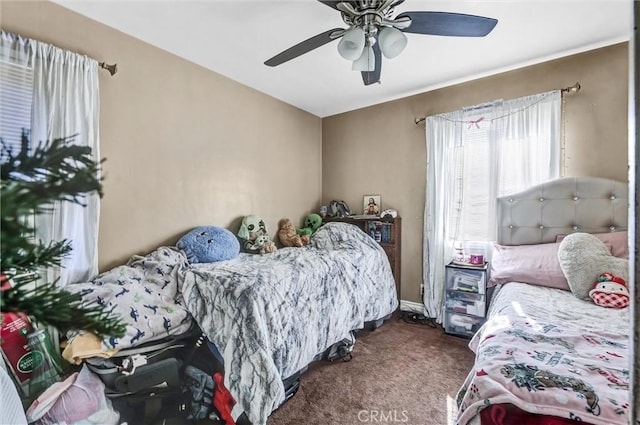 bedroom featuring ceiling fan and carpet flooring