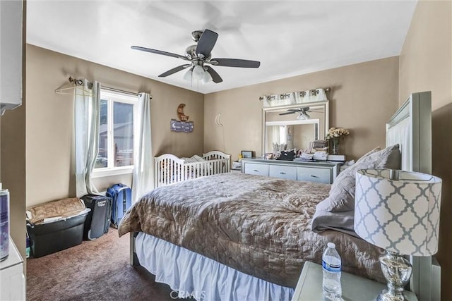 bedroom with ceiling fan and carpet flooring