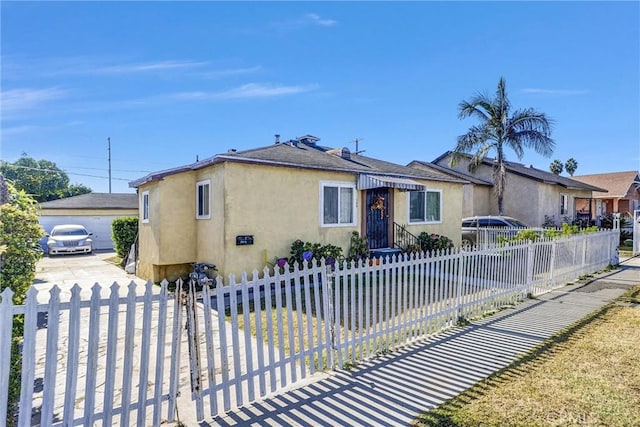 single story home with a garage