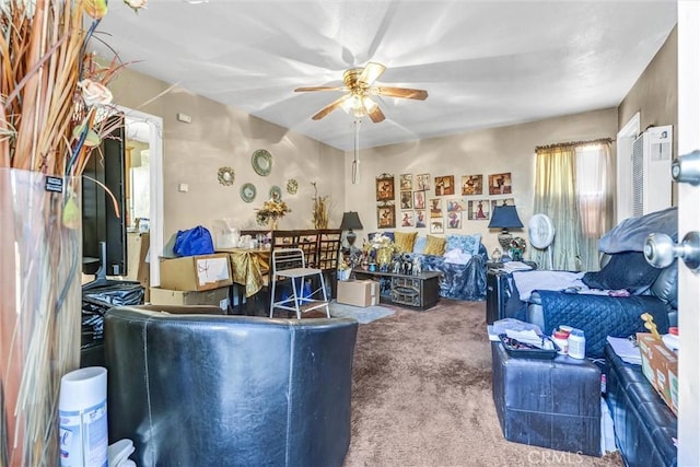 interior space featuring ceiling fan and carpet