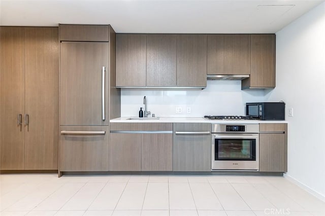 kitchen with appliances with stainless steel finishes and sink