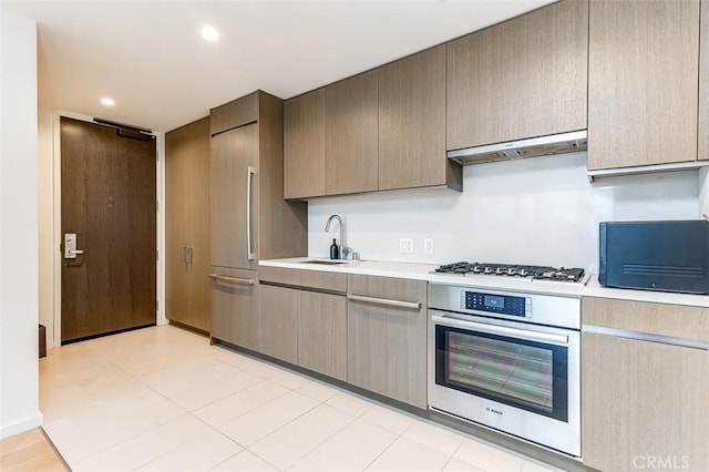 kitchen with appliances with stainless steel finishes and sink