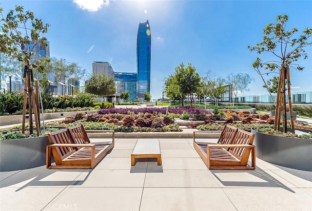 view of property's community with a patio area