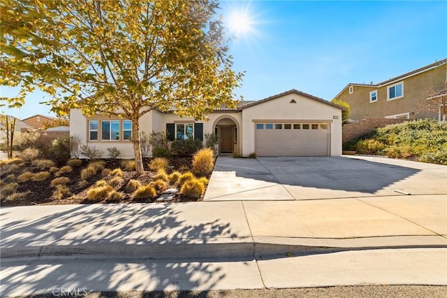 view of front of property with a garage