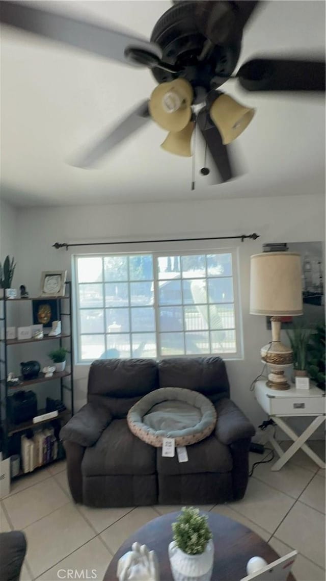 living room with tile patterned floors