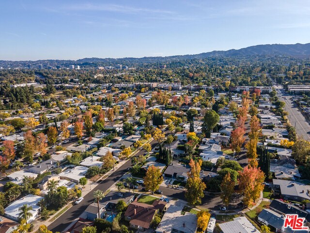 drone / aerial view featuring a mountain view